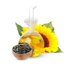 Image of Cooking oil in glass cruet, sunflower seeds and flower isolated on white