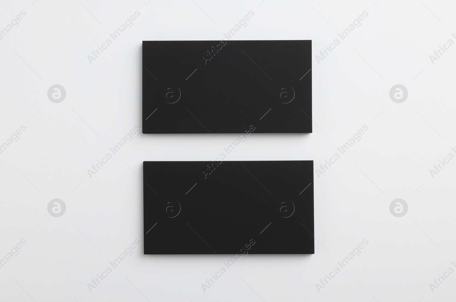 Photo of Blank business cards on light grey background, top view. Mockup for design