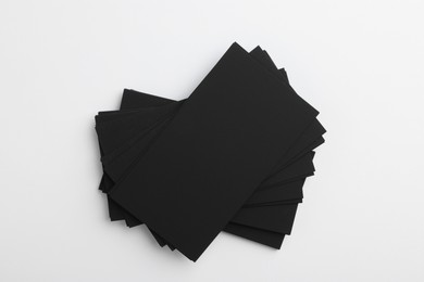 Photo of Blank business cards on light grey background, top view. Mockup for design