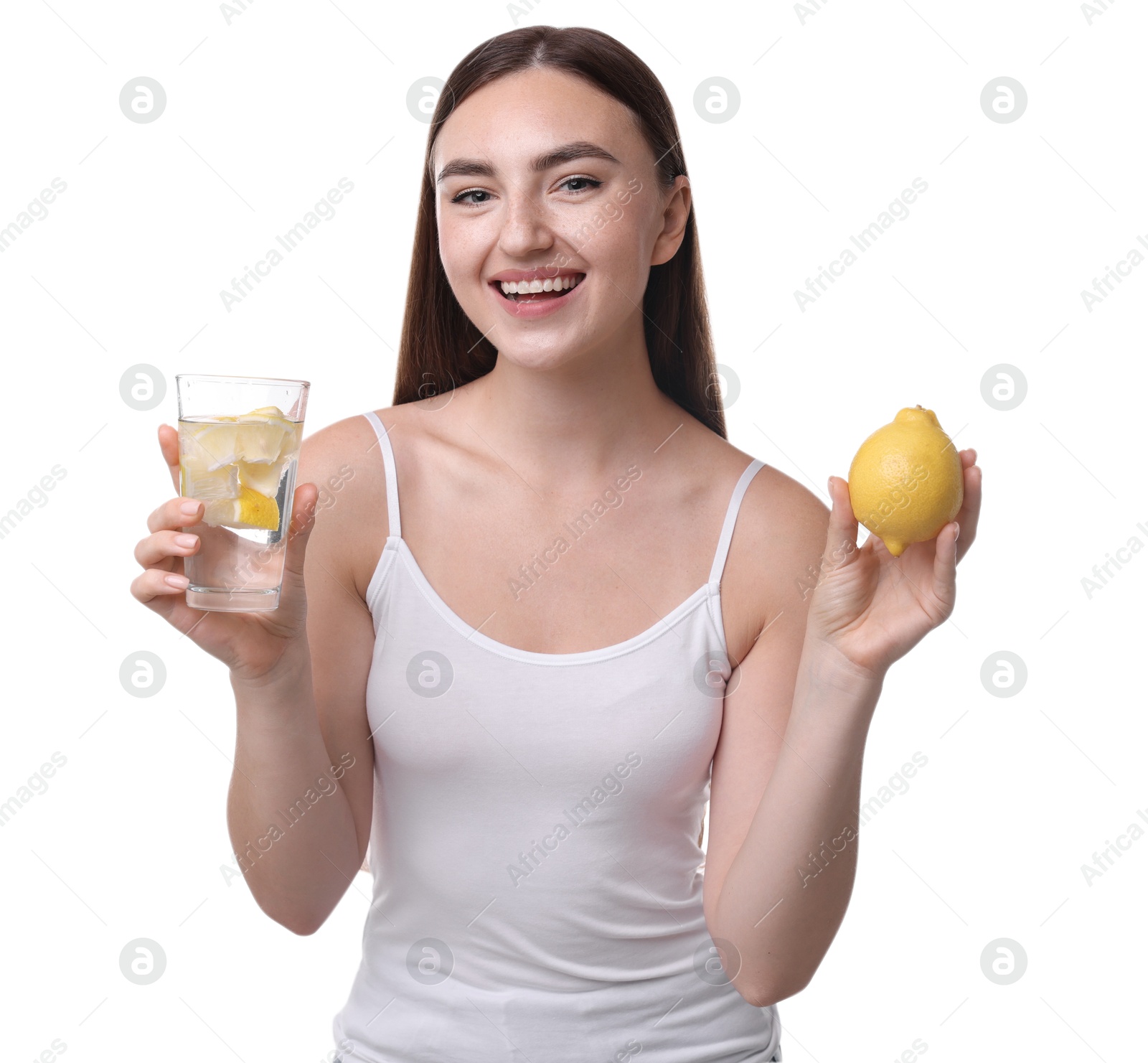 Photo of Woman with glass of lemon water and fruit on white background