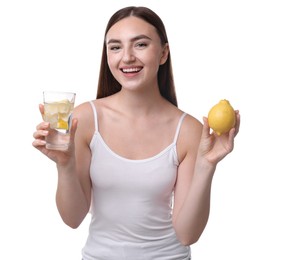 Woman with glass of lemon water and fruit on white background