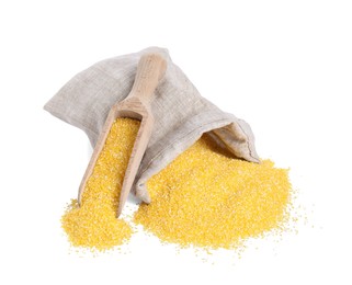 Photo of Raw cornmeal in burlap with scoop isolated on white