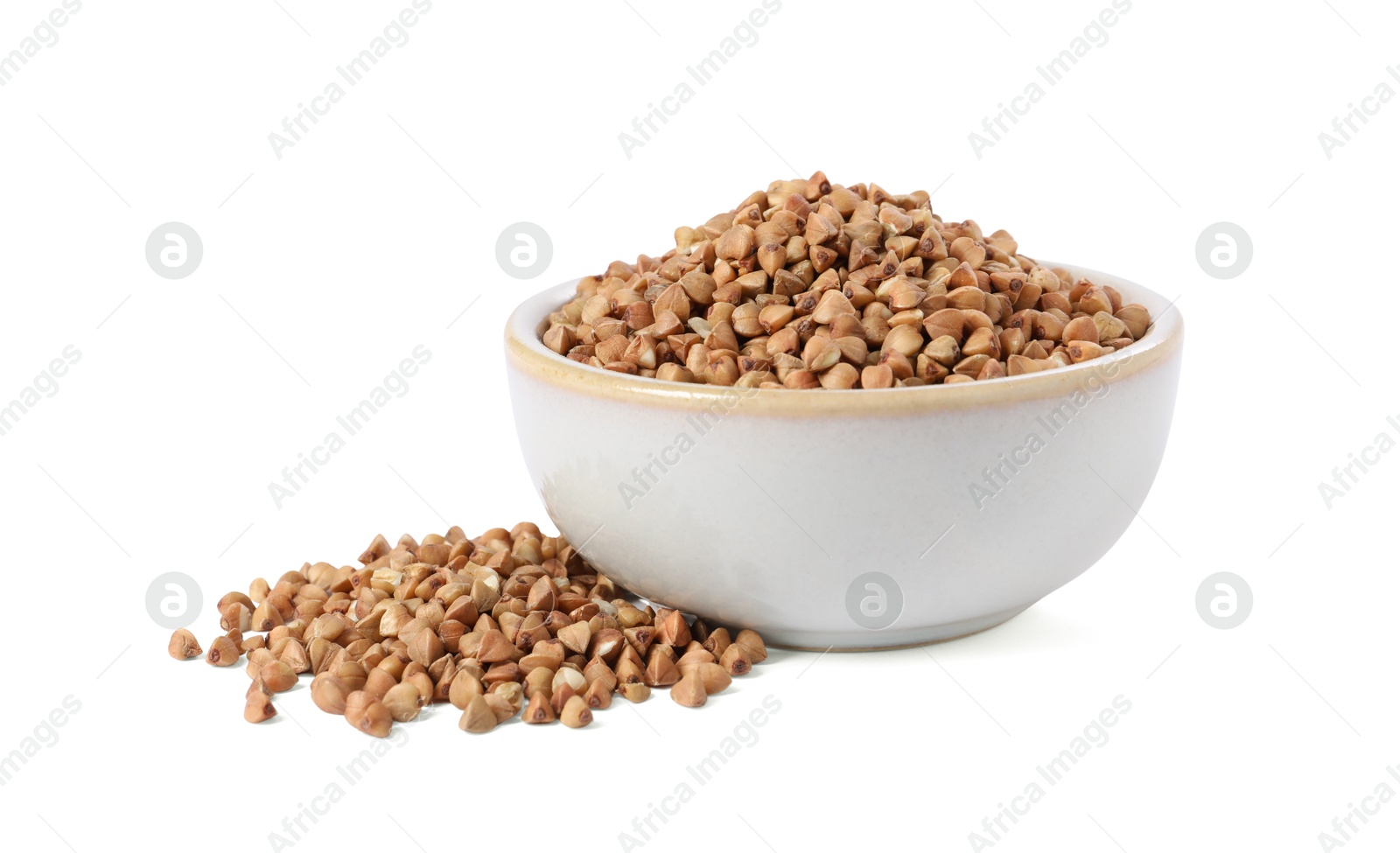 Photo of Raw buckwheat in bowl isolated on white