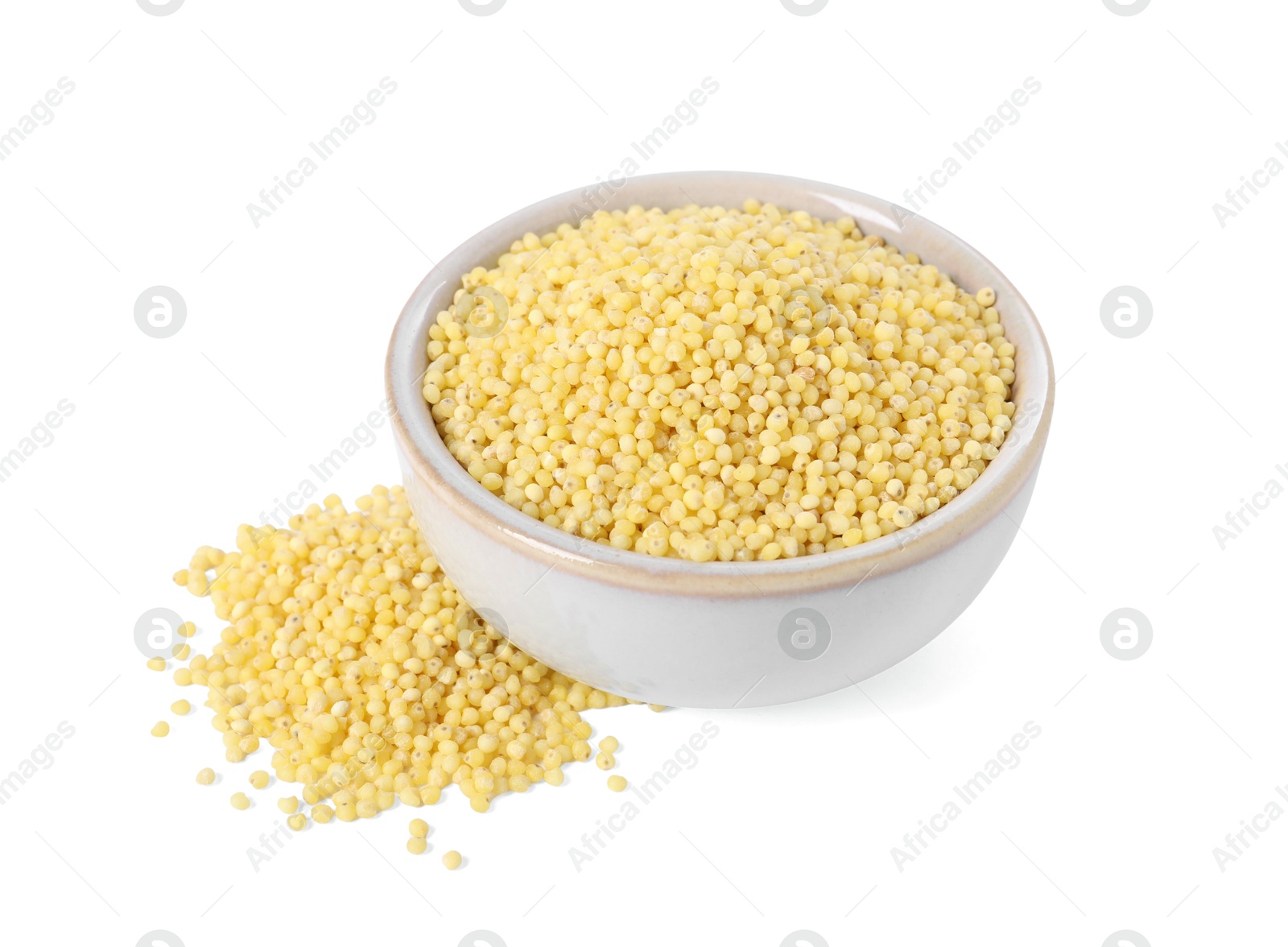 Photo of Millet groats in bowl isolated on white