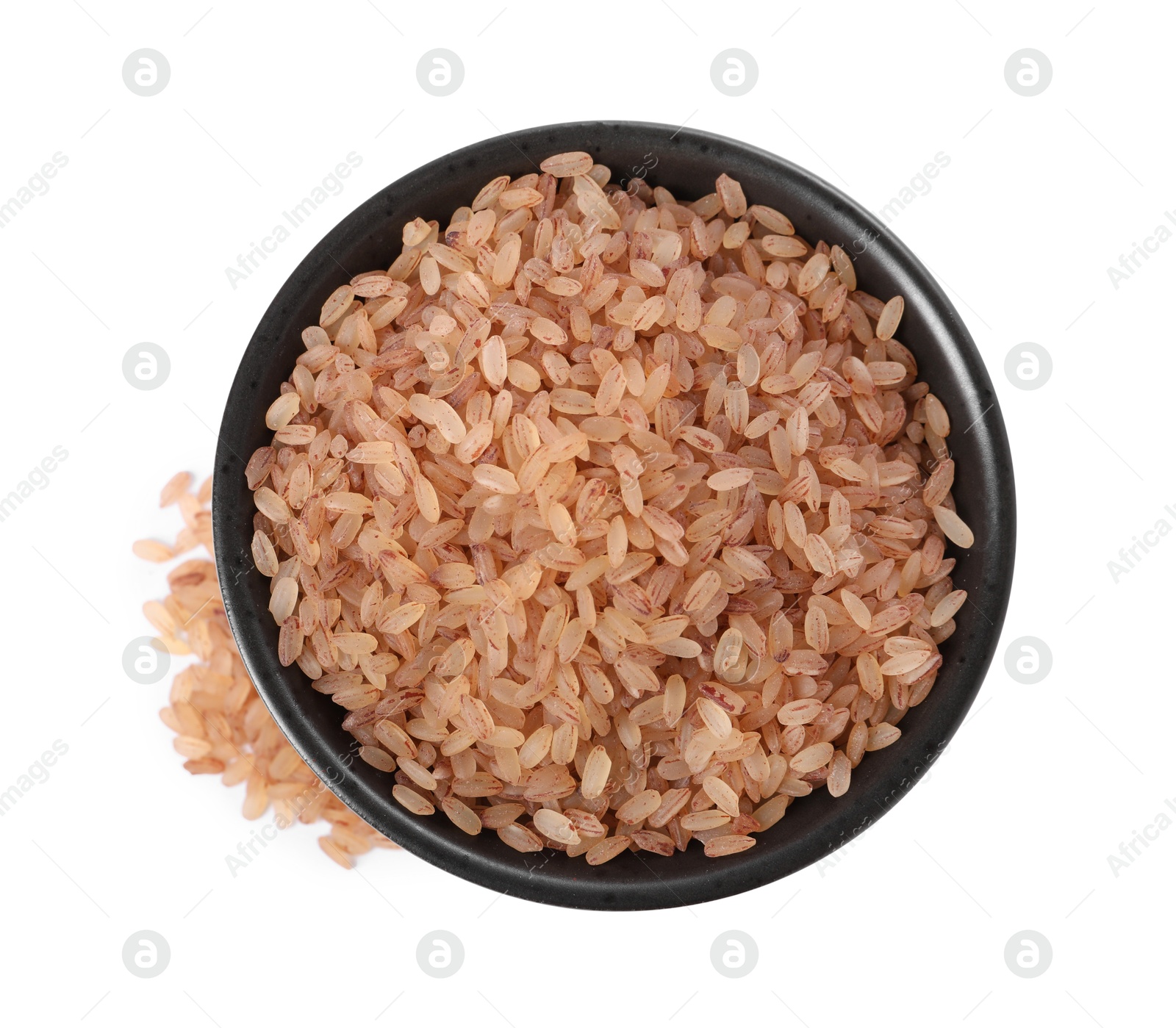 Photo of Raw organic matta rice in bowl isolated on white, top view