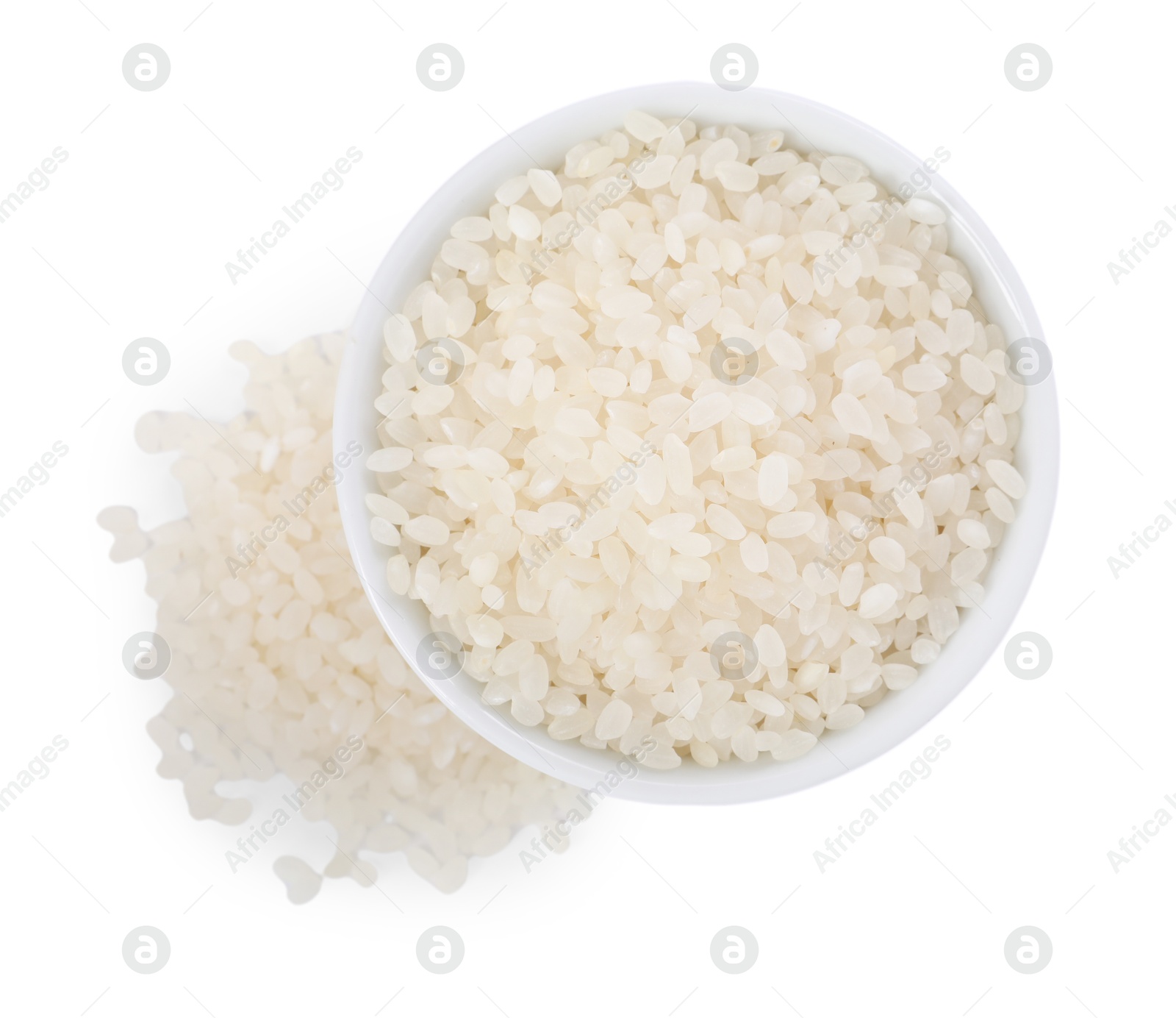 Photo of Raw rice in bowl isolated on white, top view