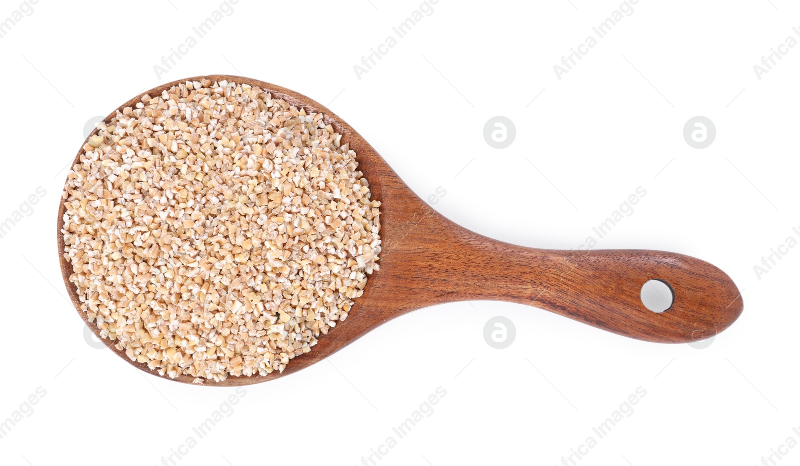 Photo of Dry wheat groats in wooden spoon isolated on white, top view