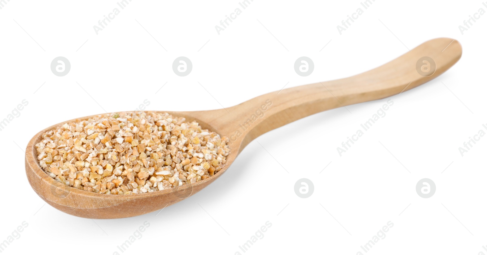 Photo of Dry wheat groats in wooden spoon isolated on white