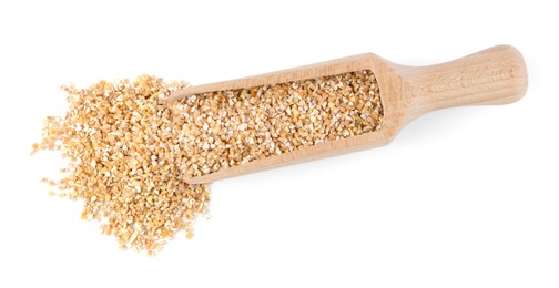 Photo of Dry wheat groats in wooden scoop isolated on white, top view