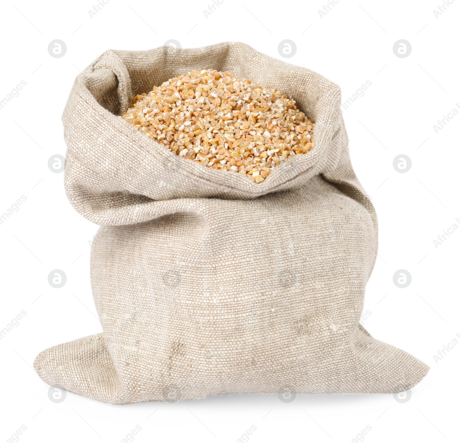 Photo of Dry wheat groats in burlap sack isolated on white