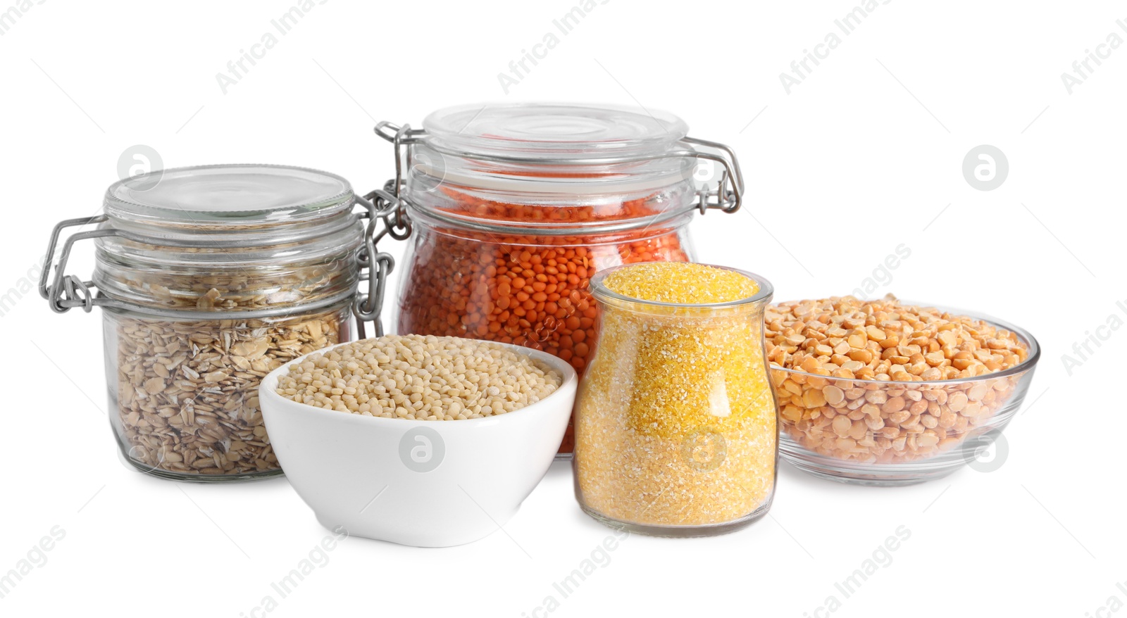 Photo of Different types of cereals and legumes isolated on white