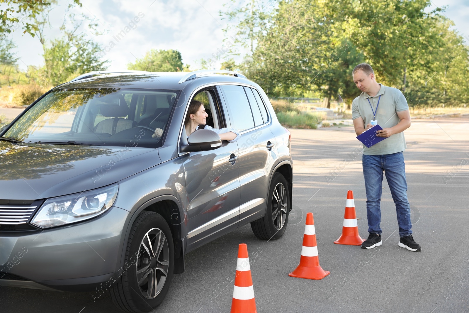 Photo of Woman passing maneuverability driving test on track