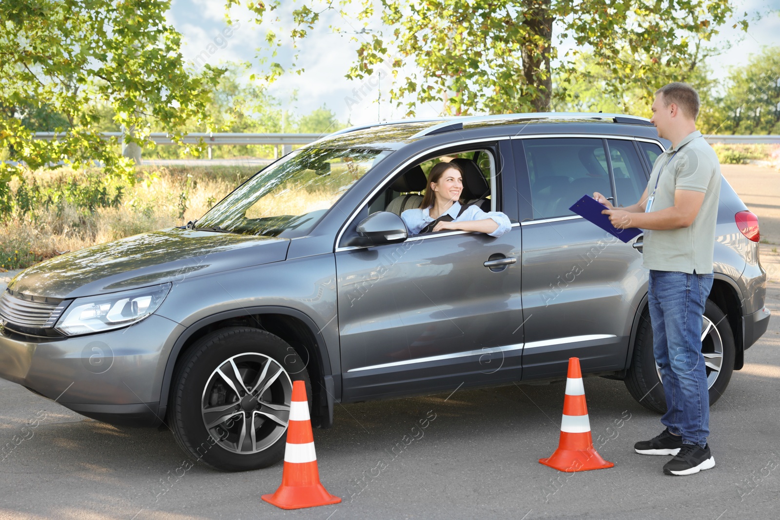 Photo of Woman passing maneuverability driving test on track