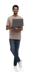 Photo of Smiling man with laptop on white background