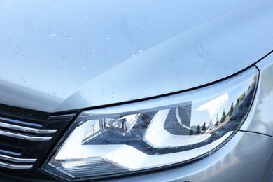 Modern auto with dirty stains, closeup view