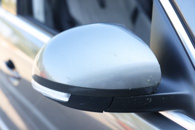 Modern auto with dirty stains, closeup view