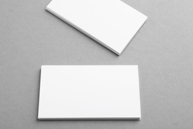 Photo of Blank business cards on grey background. Mockup for design