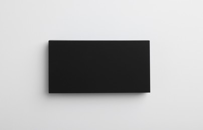 Blank business cards on light grey background, top view. Mockup for design