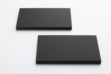 Photo of Blank business cards on light grey background. Mockup for design