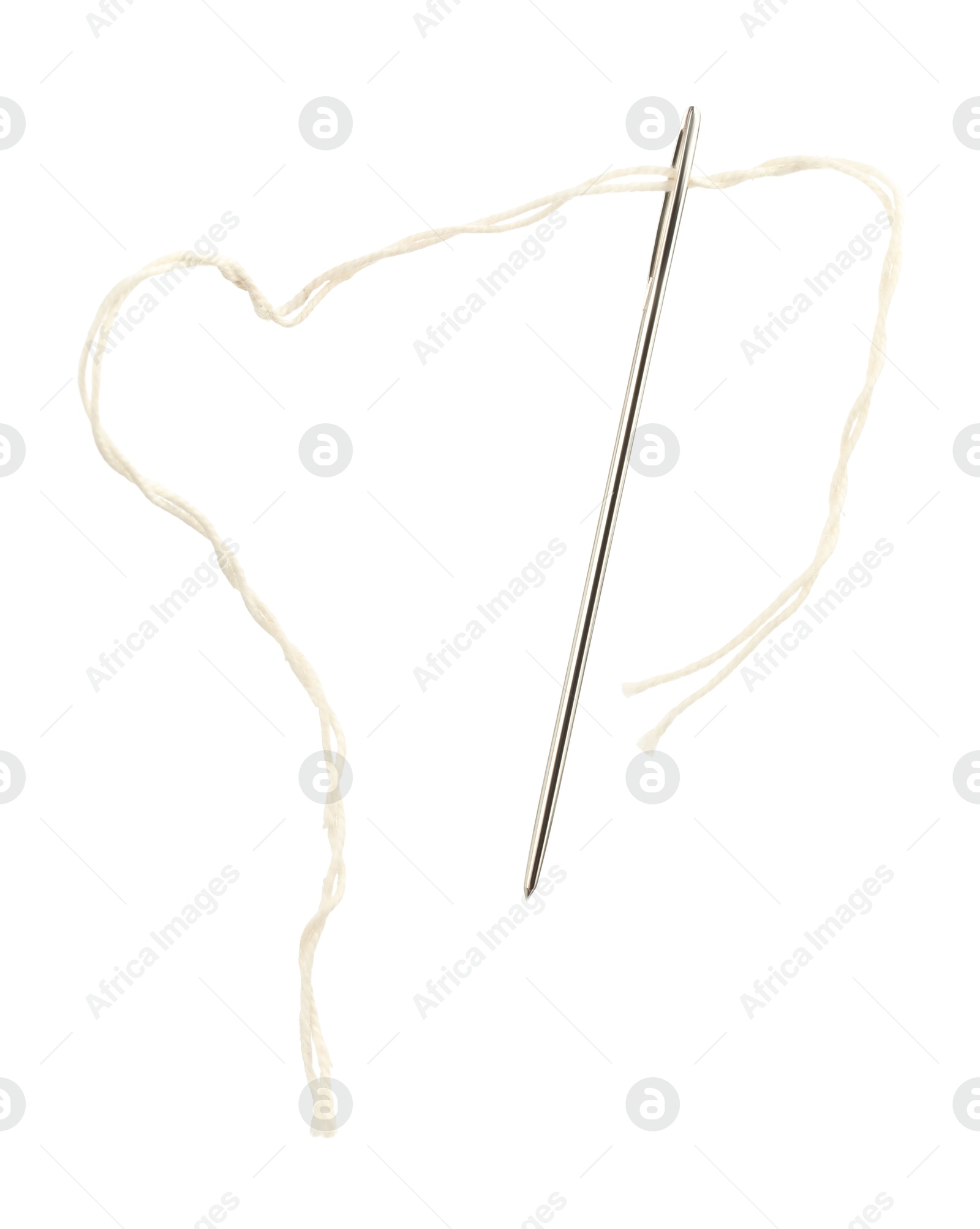 Photo of Sewing needle with beige thread isolated on white