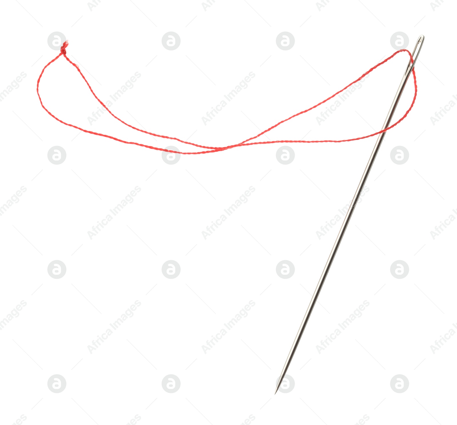 Photo of Sewing needle with red thread isolated on white