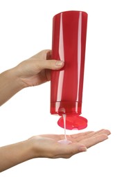 Photo of Woman pouring shampoo onto hand on white background, closeup