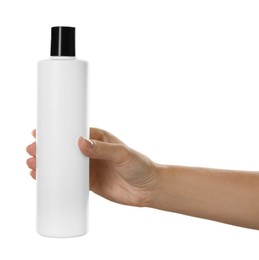 Photo of Woman with shampoo bottle on white background, closeup