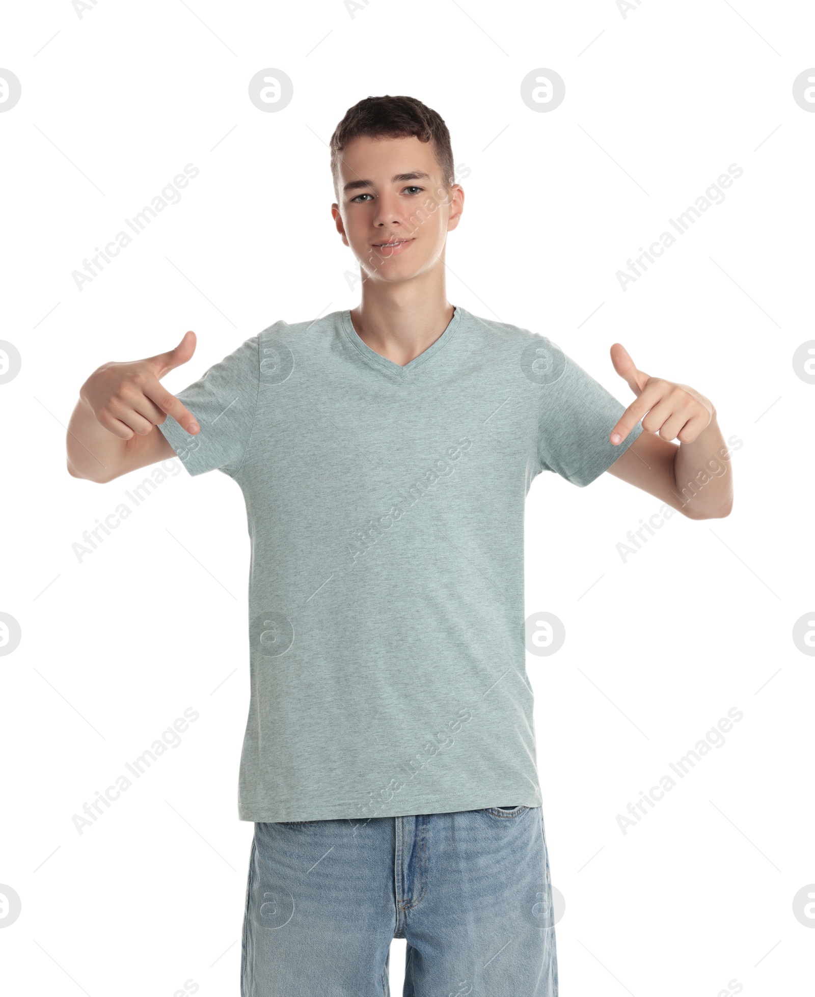 Photo of Teenage boy wearing light grey t-shirt on white background