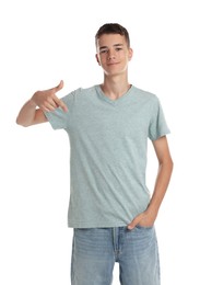 Teenage boy wearing light grey t-shirt on white background