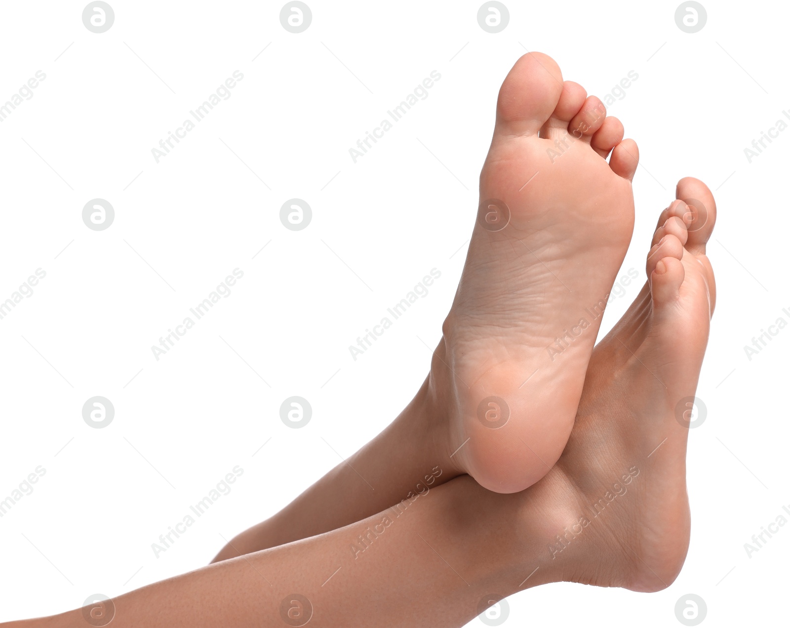 Photo of Woman with smooth feet on white background, closeup