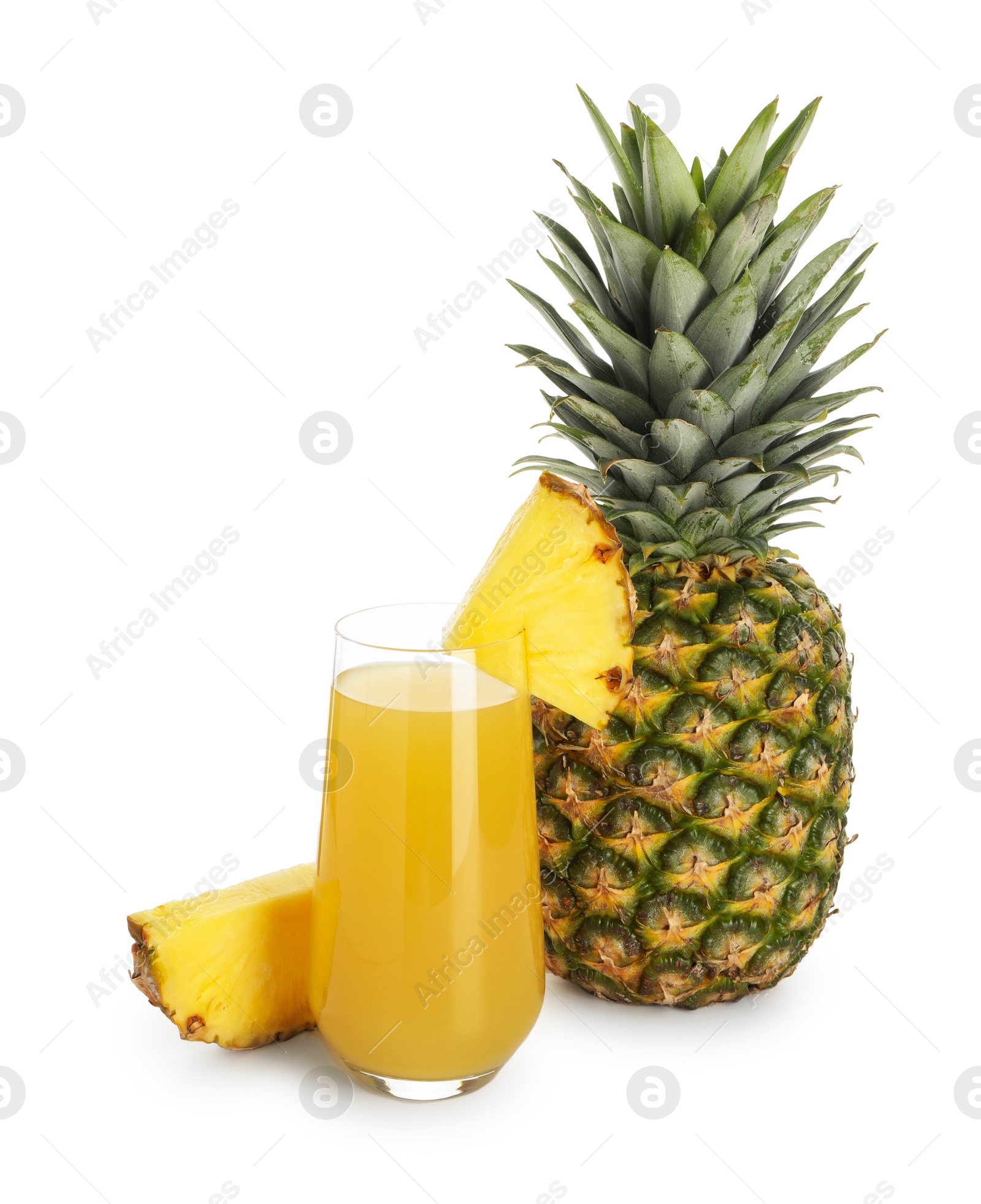 Photo of Glass with pineapple juice and fresh pineapples isolated on white