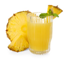 Photo of Glass with pineapple juice and pieces of fresh fruit isolated on white