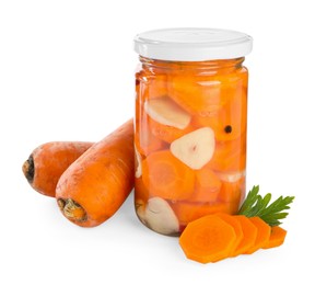 Photo of Tasty pickled carrots in jar and fresh ingredients isolated on white