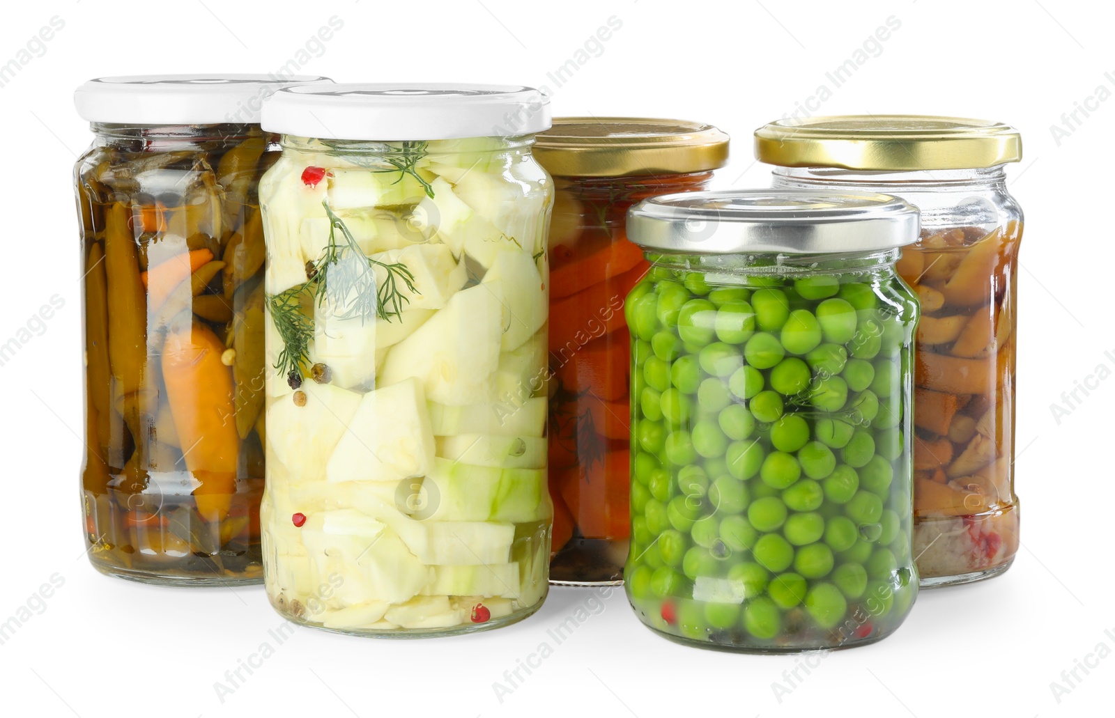 Photo of Different pickled products in jars isolated on white