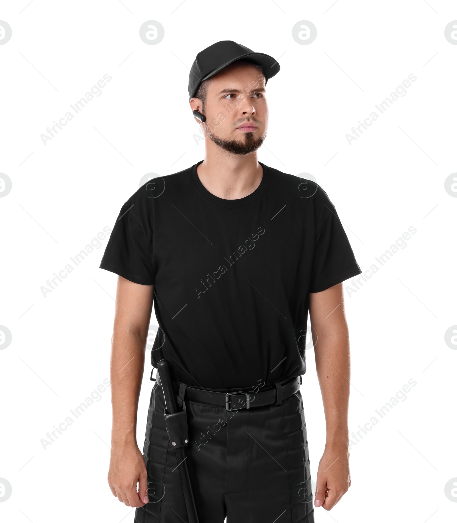 Photo of Young bodyguard with baton and earpiece isolated on white