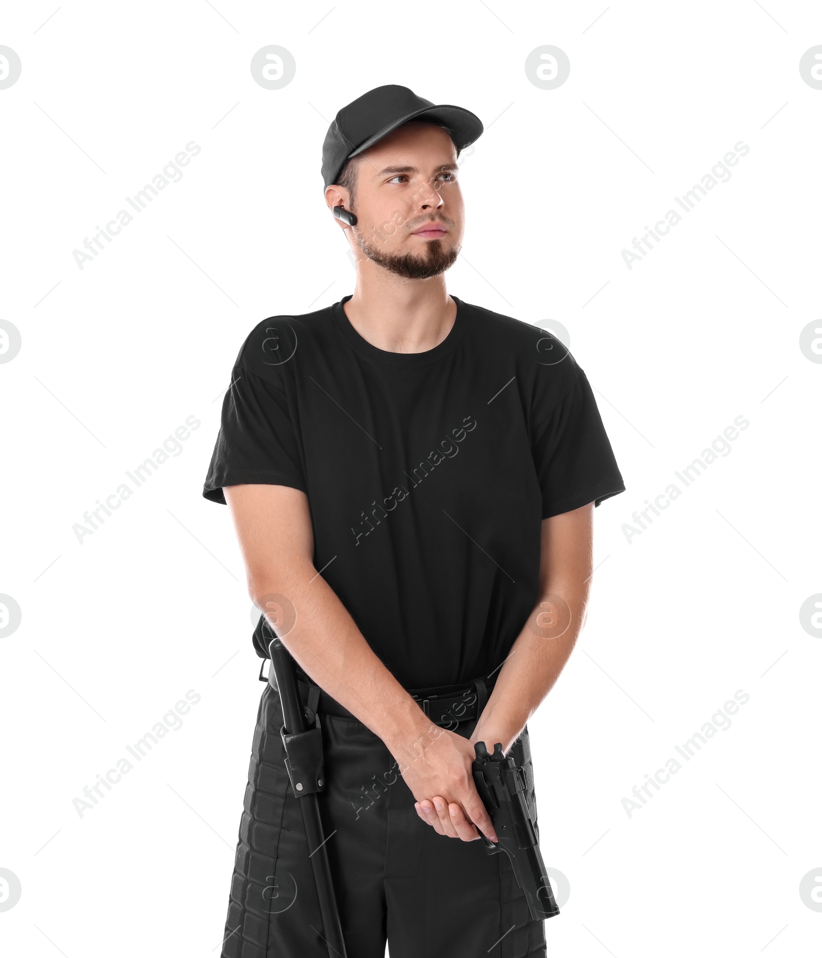 Photo of Young bodyguard with gun isolated on white