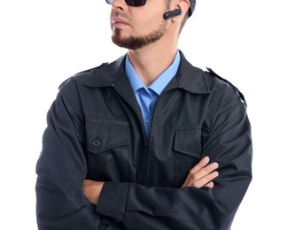 Security guard in uniform and earpiece isolated on white, closeup