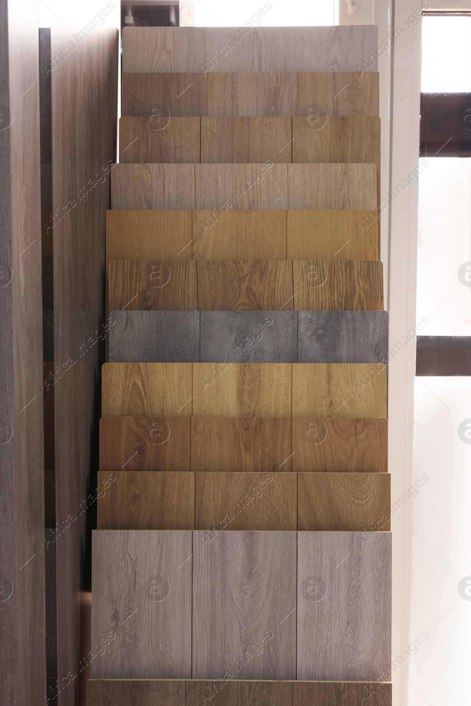 Photo of Many different samples of wooden flooring in store