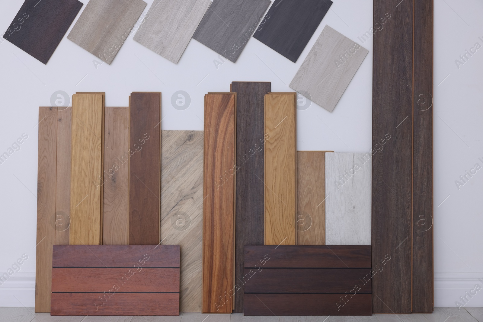 Photo of Many different samples of wooden flooring in store