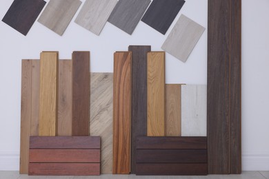 Photo of Many different samples of wooden flooring in store