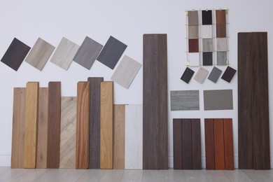 Photo of Many different samples of wooden flooring in store