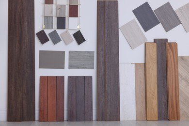 Photo of Many different samples of wooden flooring in store