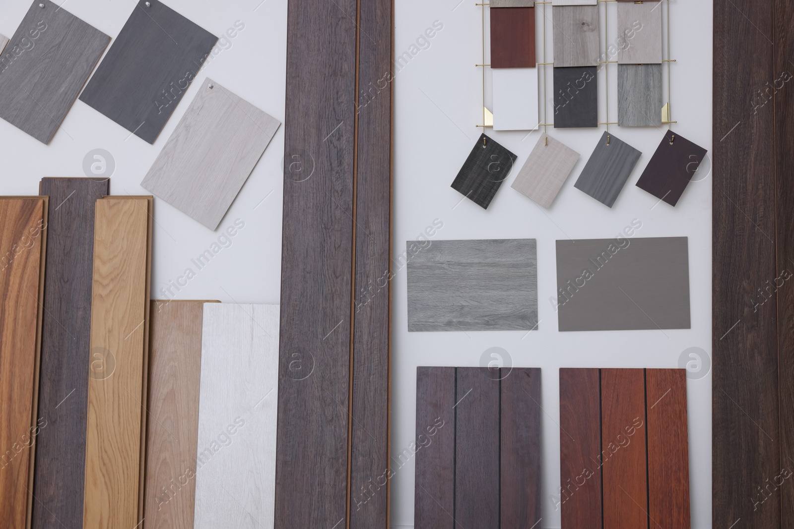 Photo of Many different samples of wooden flooring in store