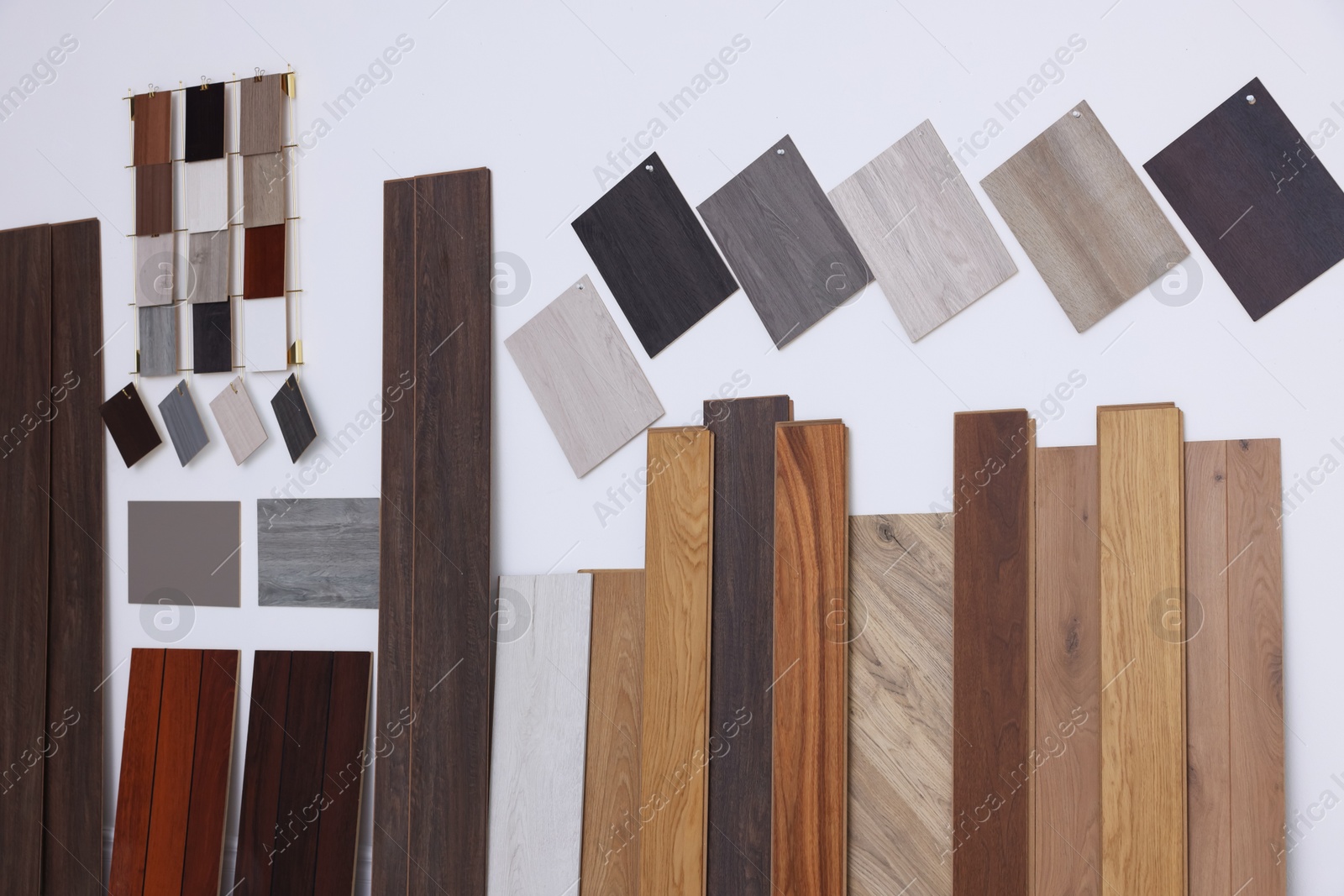 Photo of Many different samples of wooden flooring in store