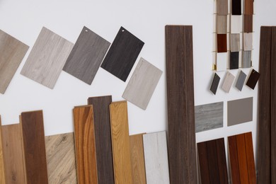 Photo of Many different samples of wooden flooring in store