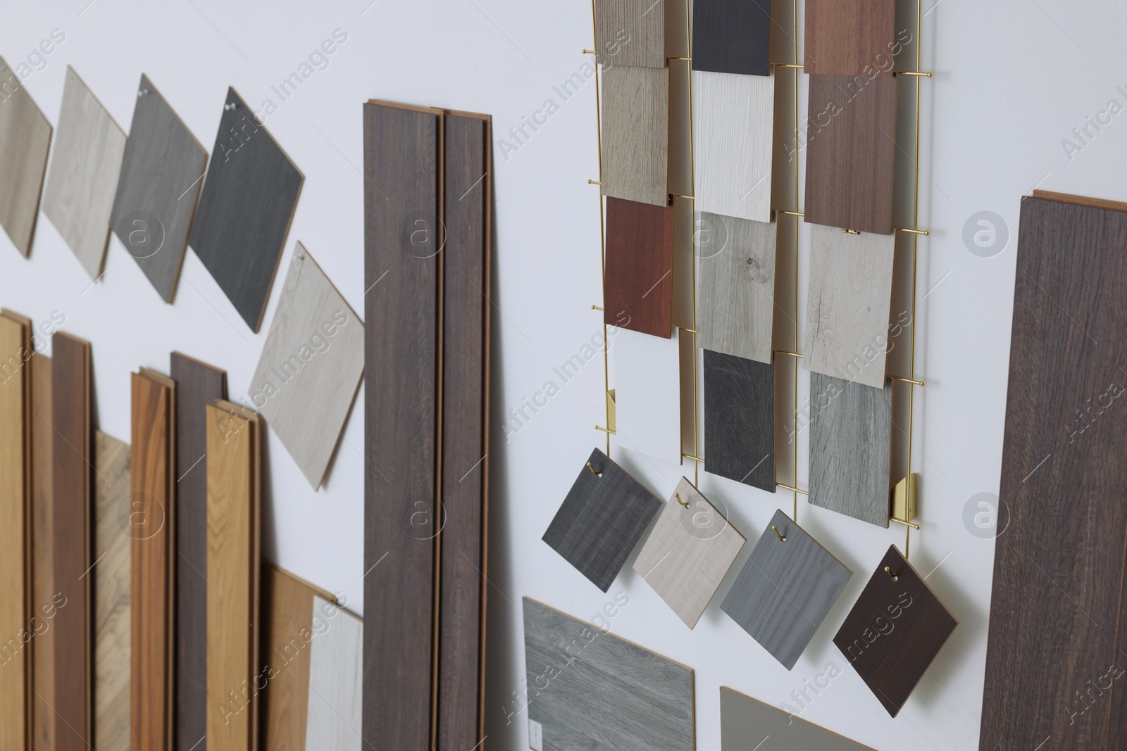 Photo of Many different samples of wooden flooring in store