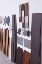 Photo of Many different samples of wooden flooring in store