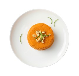 Photo of Plate with tasty mashed sweet potato, rosemary and walnuts isolated on white, top view