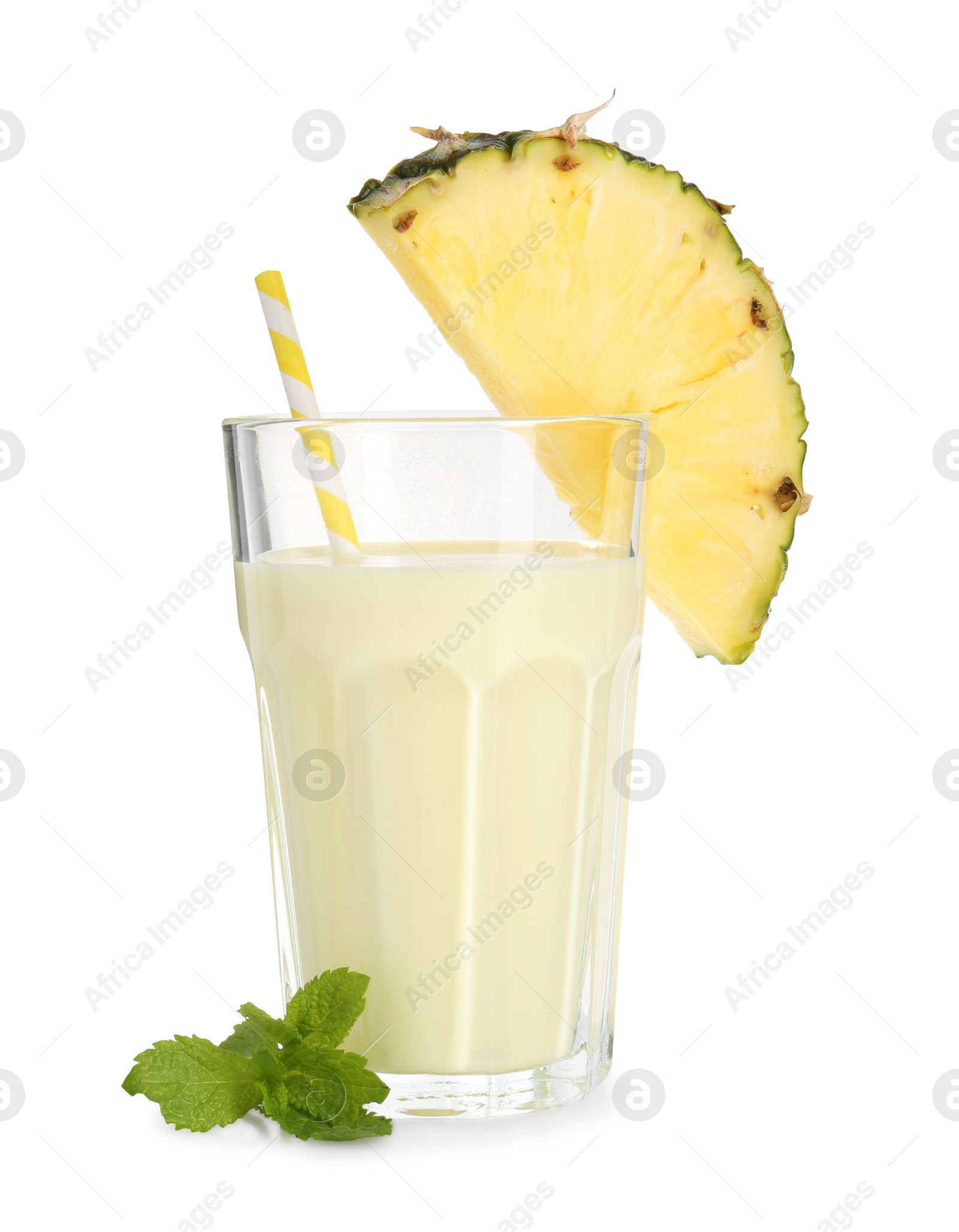 Photo of Tasty pineapple smoothie in glass, mint and slice of fruit isolated on white