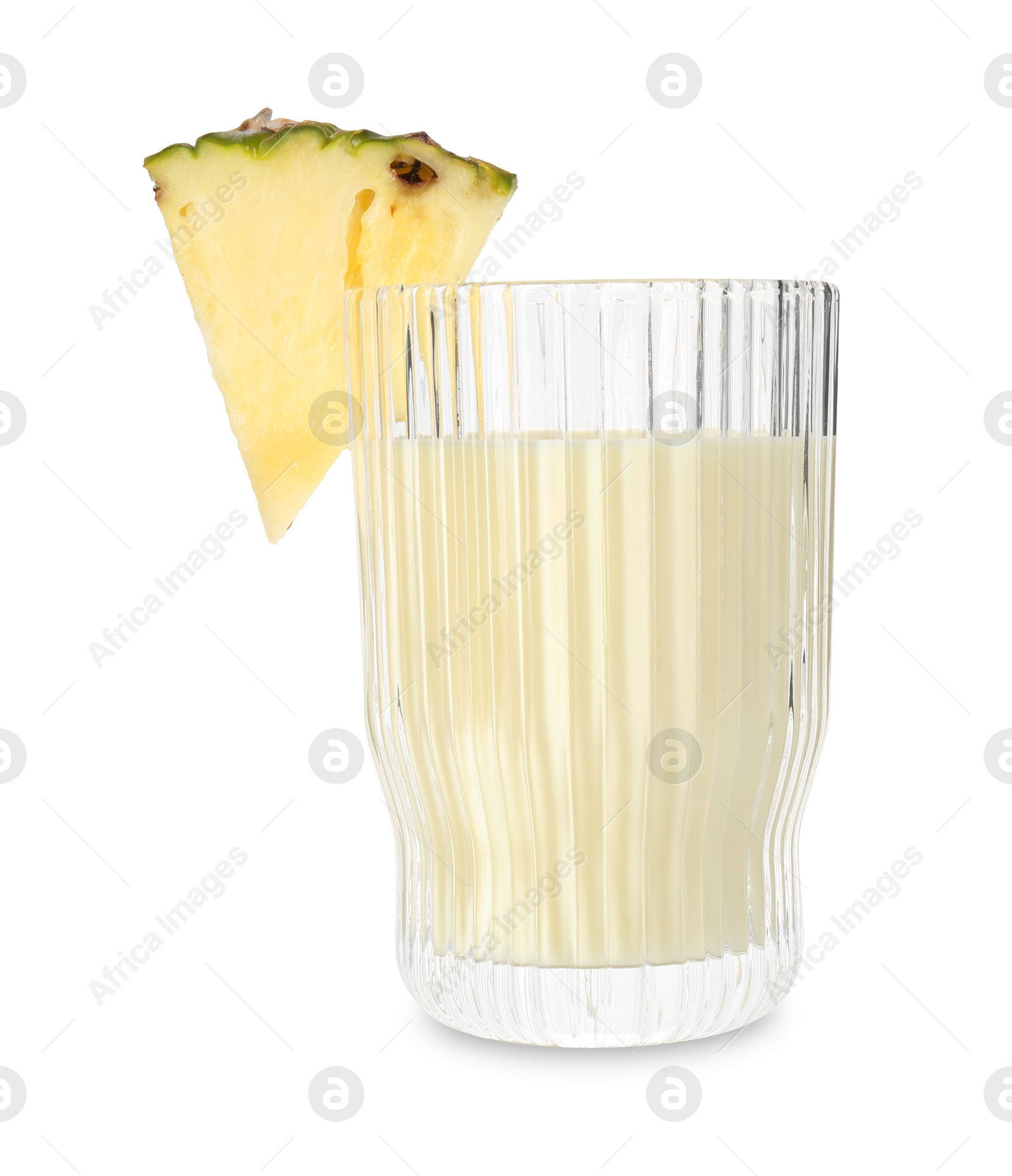 Photo of Tasty pineapple smoothie in glass and slice of fruit isolated on white